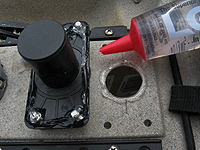 Apply sealant to rod mount and hardware